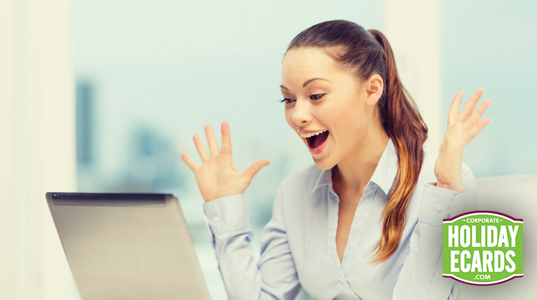 Business woman excited to receive e-greeting from a colleague.